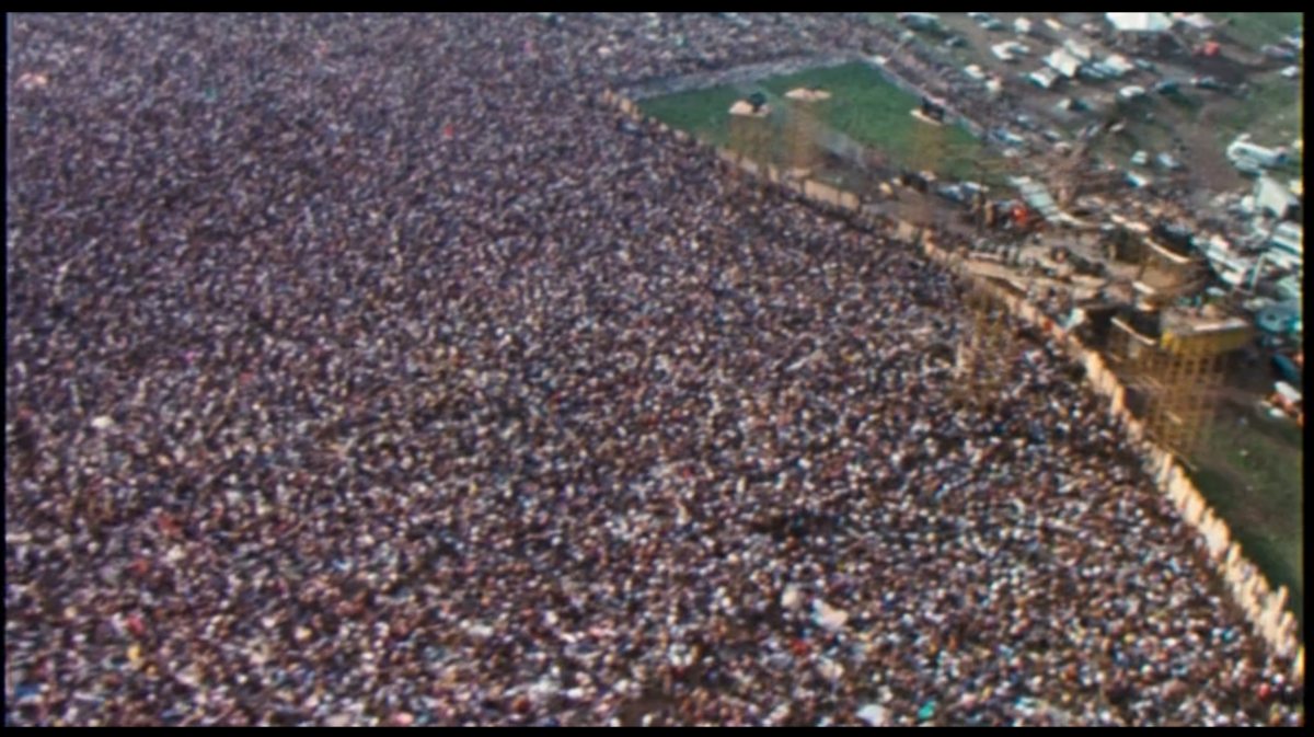 Aerial shot of the hundreds of thousands of people attending the festival.
