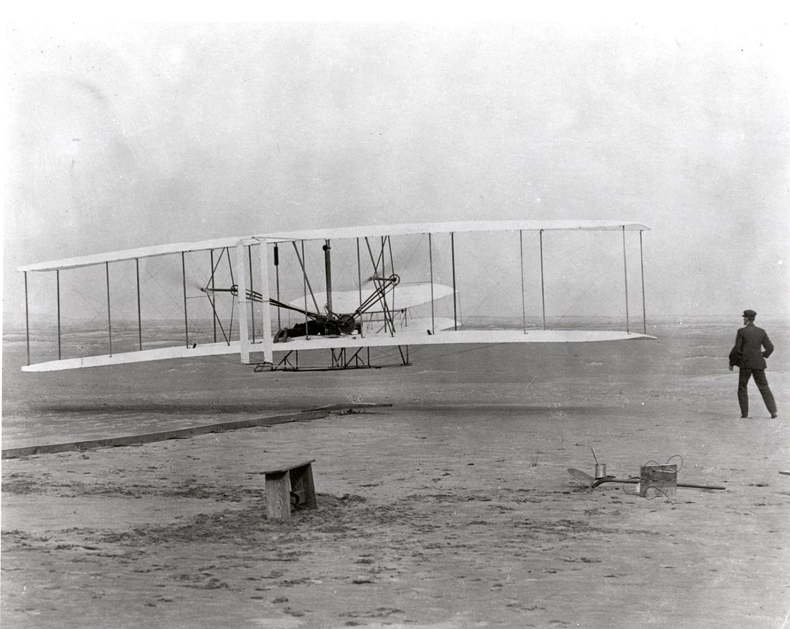 The Wright Brothers' first heavier-than-air flight in 1903, lasting 12 seconds.