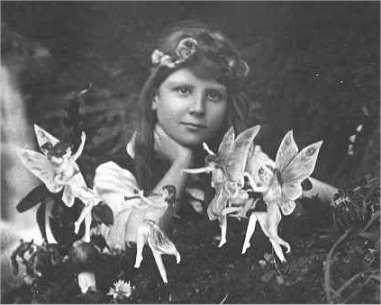 The first of the Cottingley Fairies photographs, showing Florence Griffiths surrounded by "fairies".