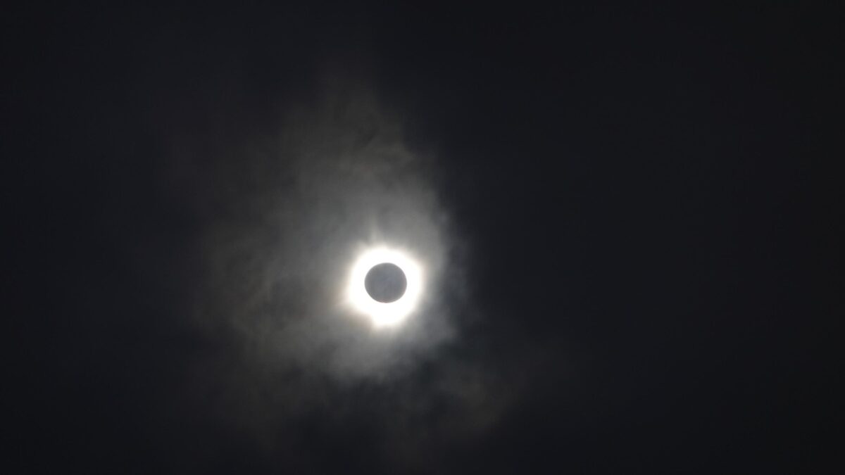 The eclipse, slightly clouded, as seen from Dallas.